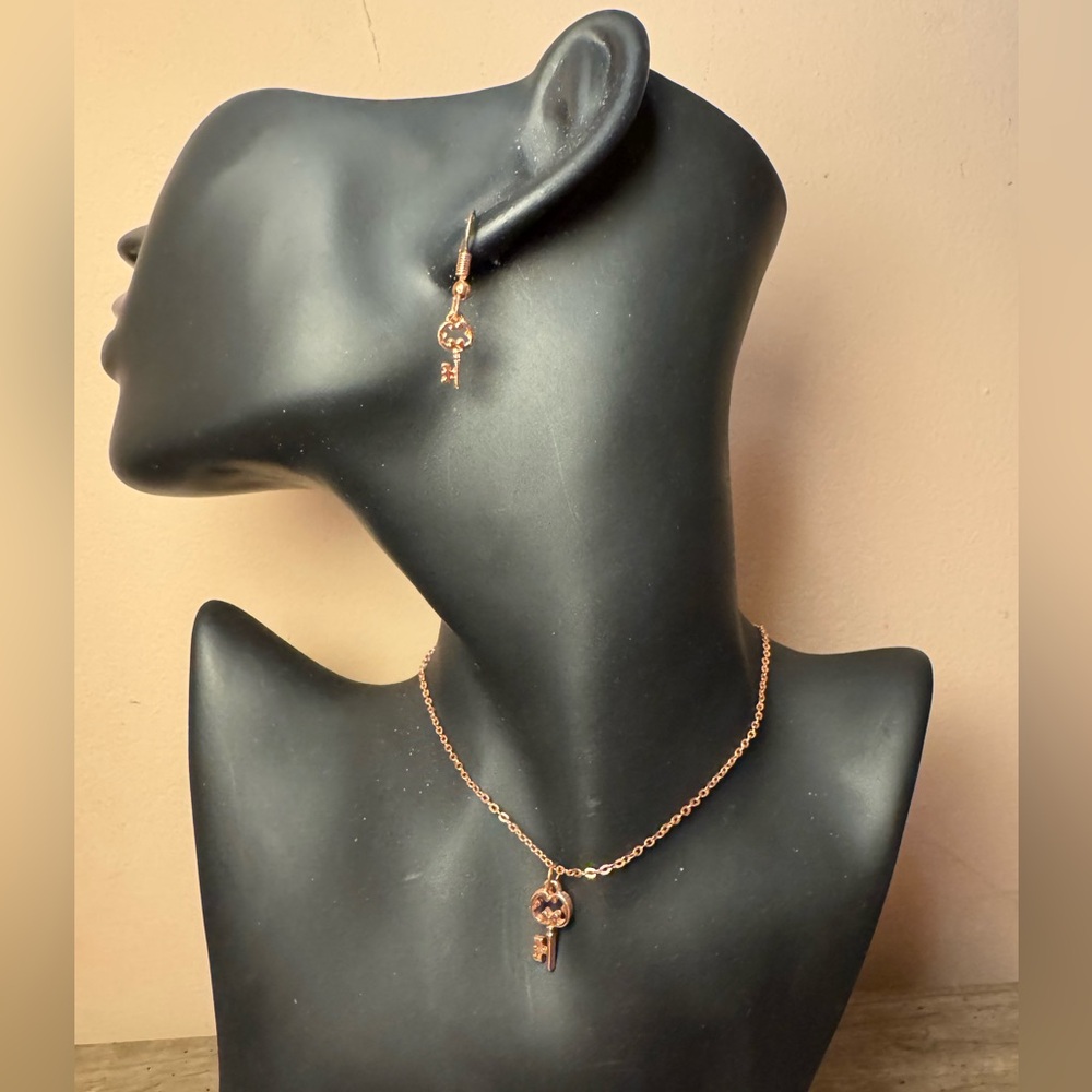 Paparazzi Key Pendant Gold Tone Necklace and Earring Set